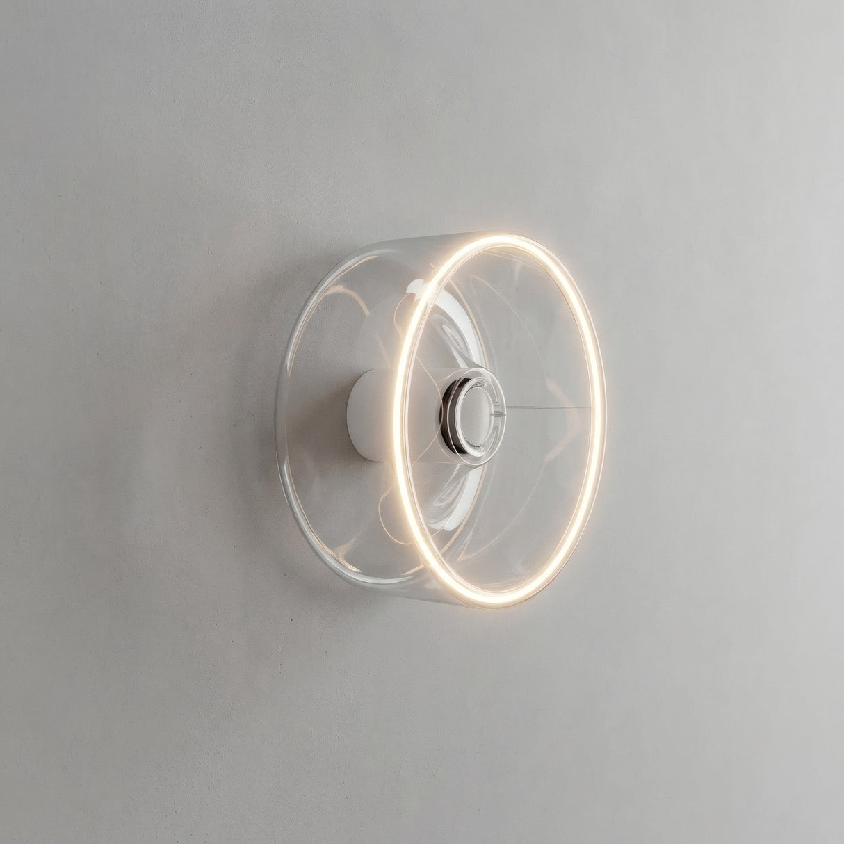 Lâmpada LED donut E27 em vidro transparente, Ø 195 mm, acesa como aplique de parede num interior sóbrio