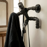 Suporte "Le Grimpeur" para cabides