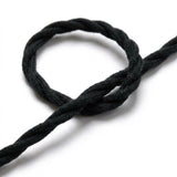Pormenor do cabo têxtil entrançado, algodão preto carvão