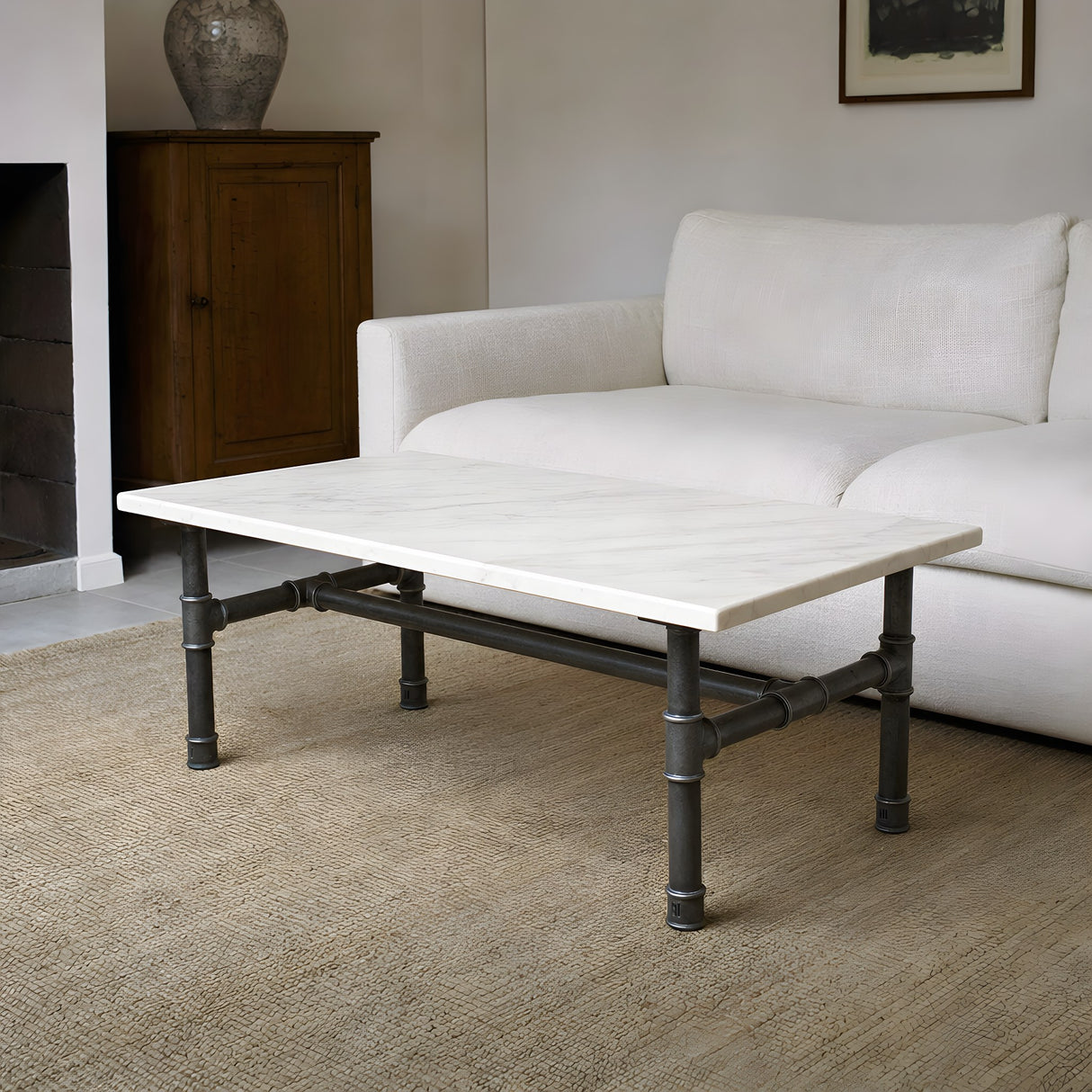 Base de mesa de centro, ferro fundido e aço envernizado, em H Ø 42 mm, em ambiente sob um tampo em mármore branco