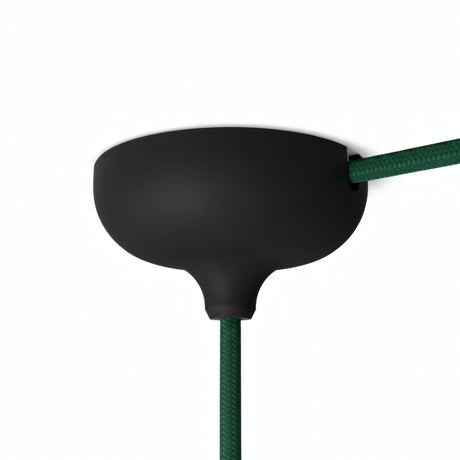 Florão em silicone Ø 88 mm, furo central e saída lateral — Preto